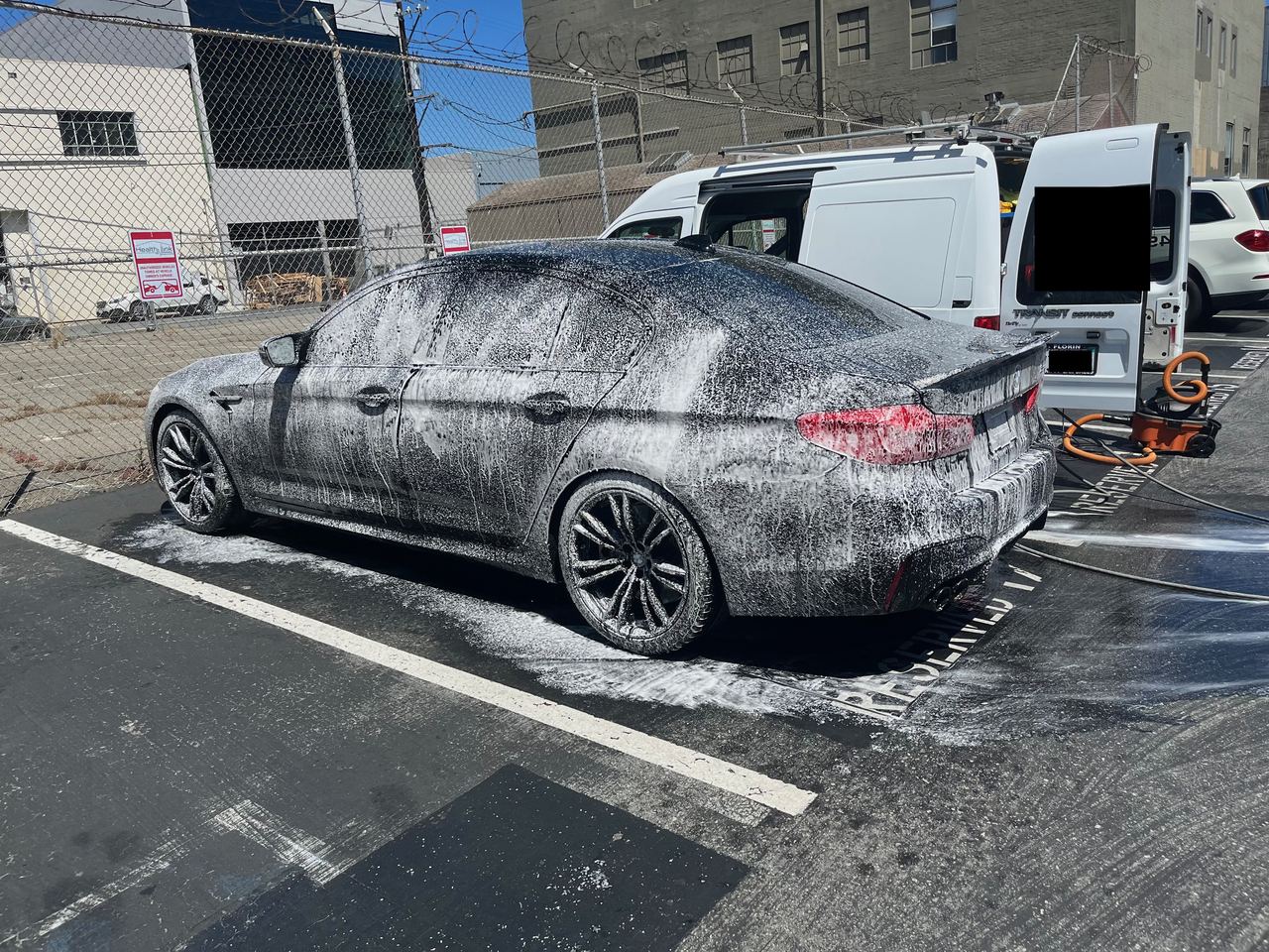 BMW M5 covered in wash foam