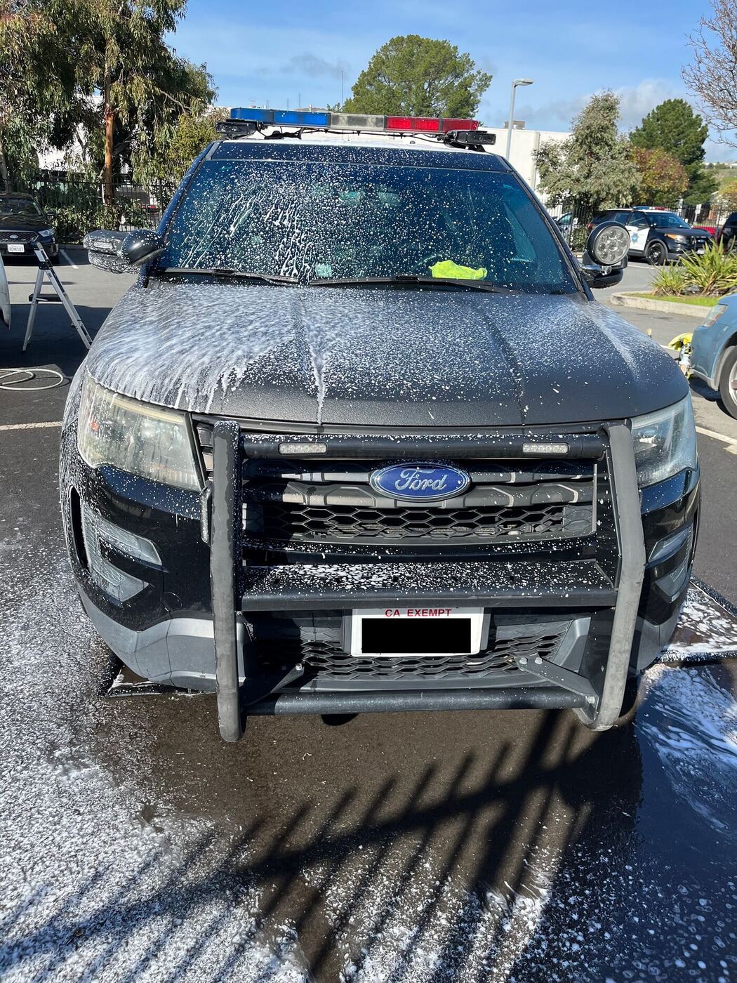 Ford Explorer fleet vehicle covered in wash foam