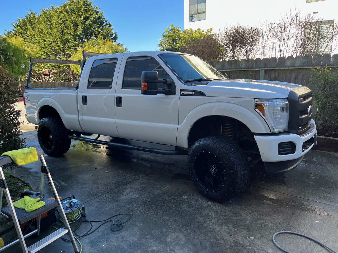 White lifted Ford F-250 Super Duty detailed